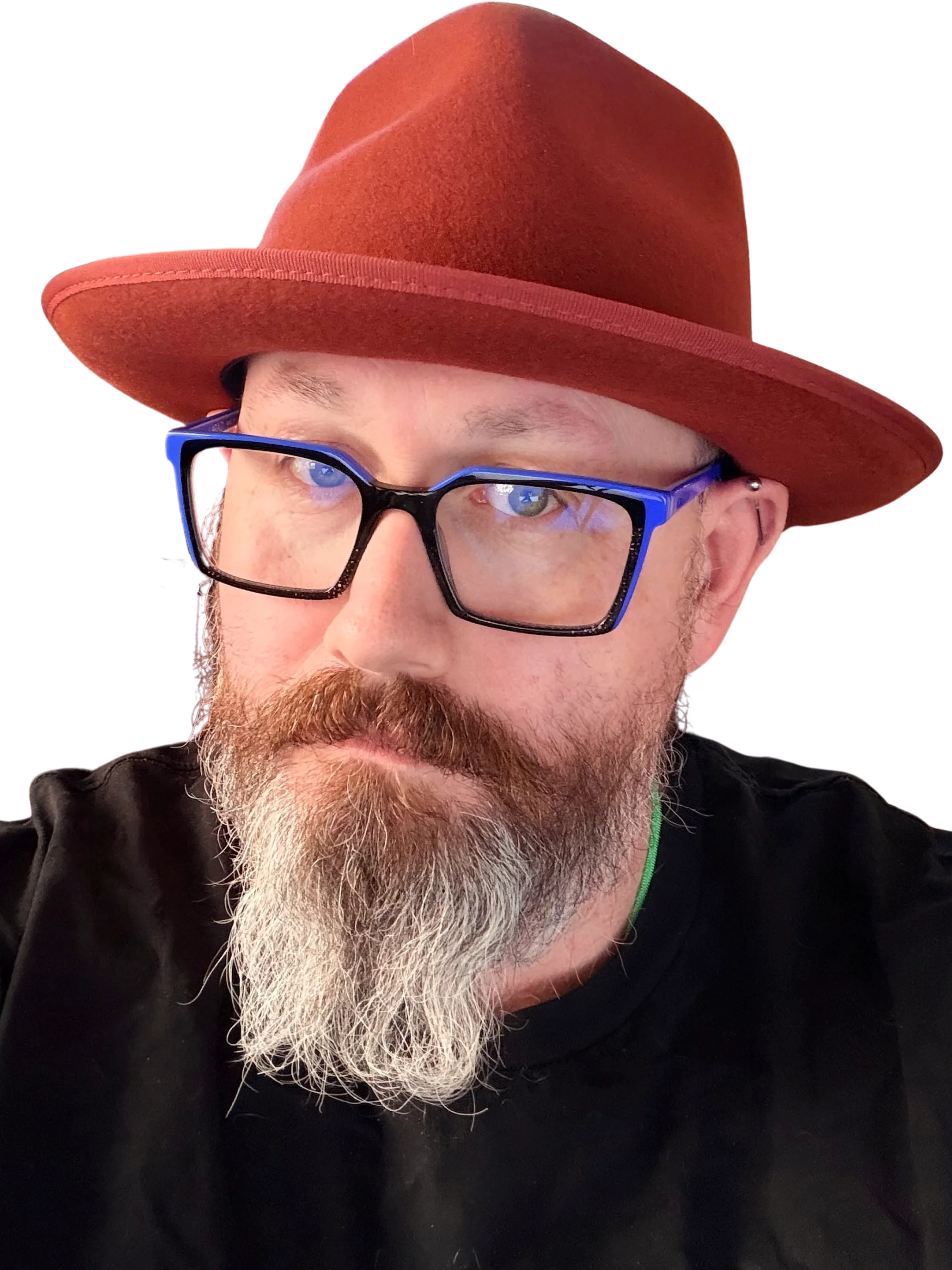 Rich Bennetts in a red fedora and blue-rimmed glasses